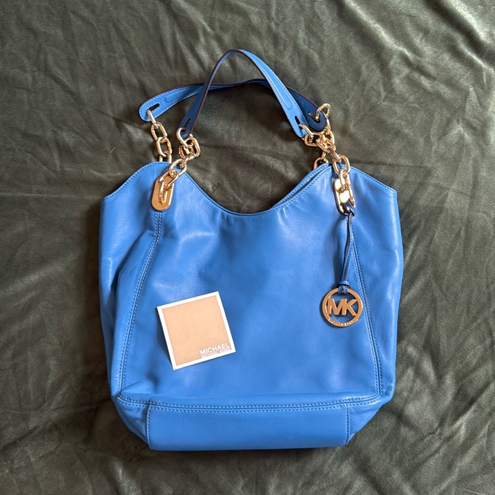Bright Blue leather Michael Kors shoulder bag, gold chain. Good condition